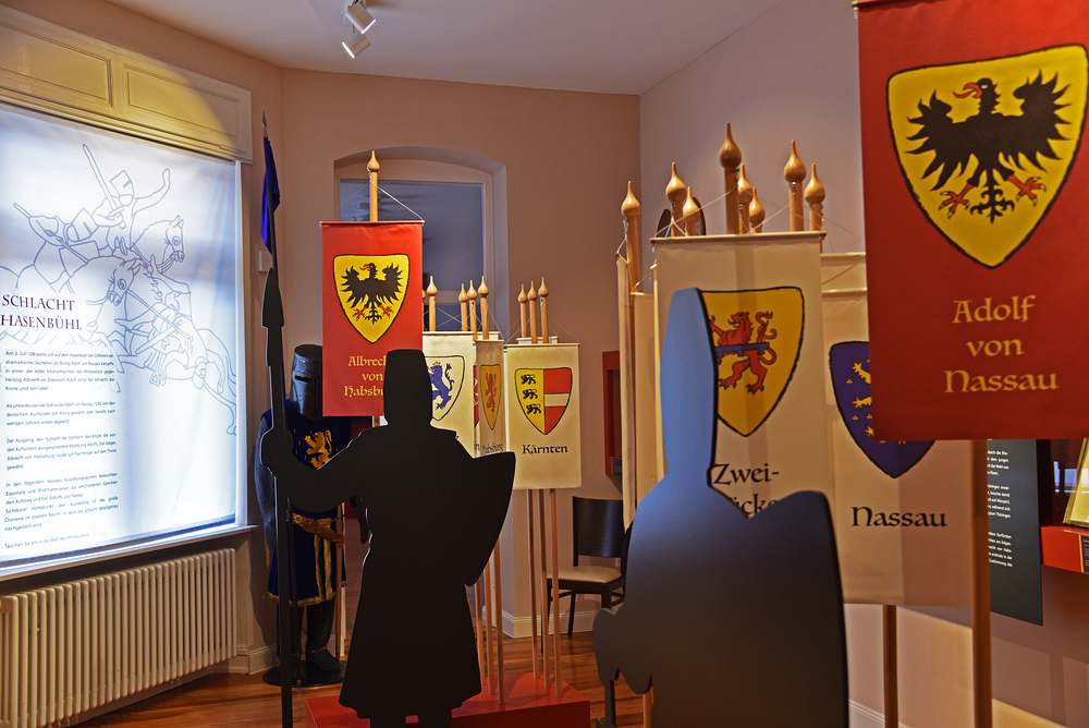 Schwerpunkt der Dauerausstellung um Museum Uhl'sches Haus ist die mittelalterliche Ritterschlacht am Hasenbühl von 1298, die sich 2023 zum 725. Mal jährt. 
